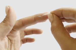 How to remove superglue from fingers