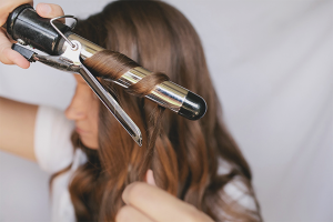 How to wind hair on a curling iron